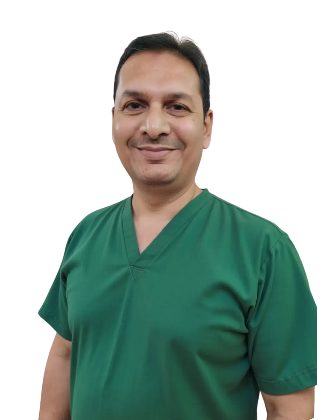 Portrait of Dr. Gaurav Gupta in green scrubs, expert in dental crowns and bridges in Varanasi